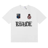 Rhude T Shirts Gothic Letter Badge Printing Cotton Casual Crew Neck Short Sleeve Men and Women