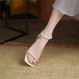 Nude Low Block Heel Stringed Pearls Word with Chunky Heel