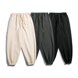Man Fall Loose Casual Trousers Multi-Pocket Elastic Mid Waist Ankle Banded Pants