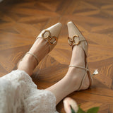 Nude Low Block Heel Pointed Patent Leather Horsebit Buckle